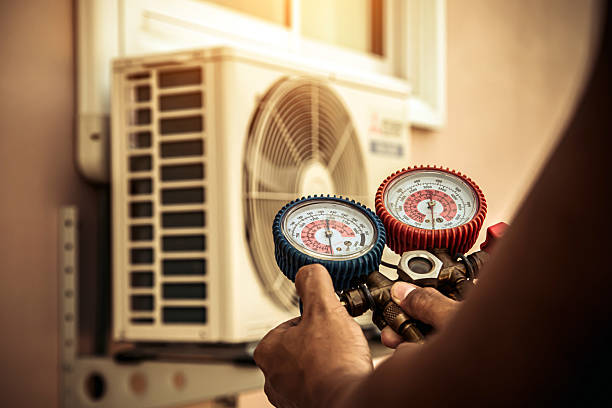 Professional Air Conditioning Service technician working in Danville, AL